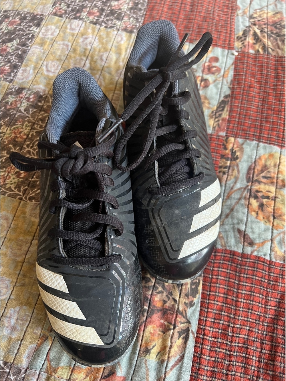 Adidas black and white soccer cleats